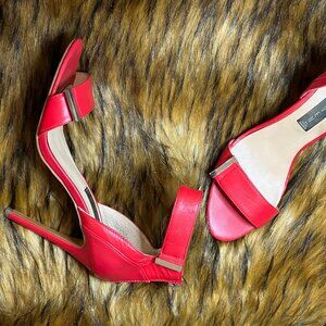 Vibrant Red High Heeled Sandals with Sleek Design and Thin Straps